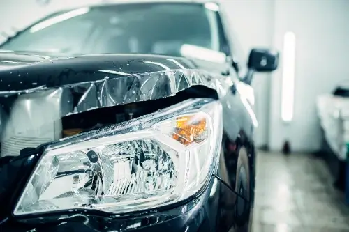 Car hood wrapped in paint protection film