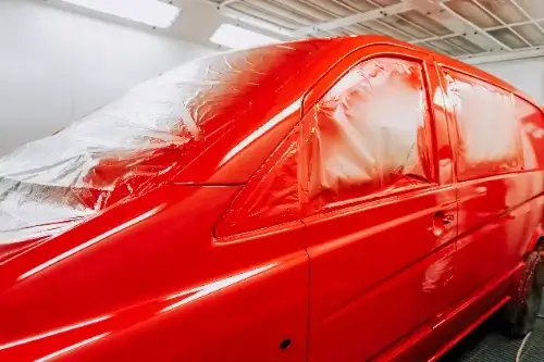 Red van in paint booth