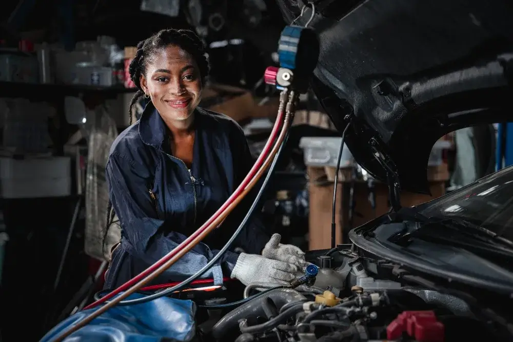 Mechanic examining the engine bay